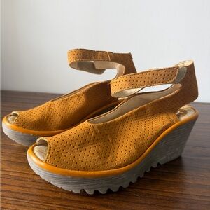 Fly London Women’s Perforated Mustard Yellow Leather and Rubber Slingback Wedges
